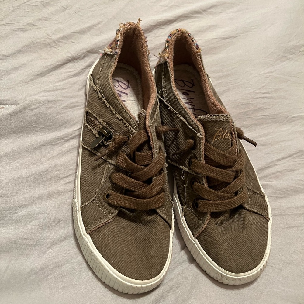 Army green canvas slip ons.